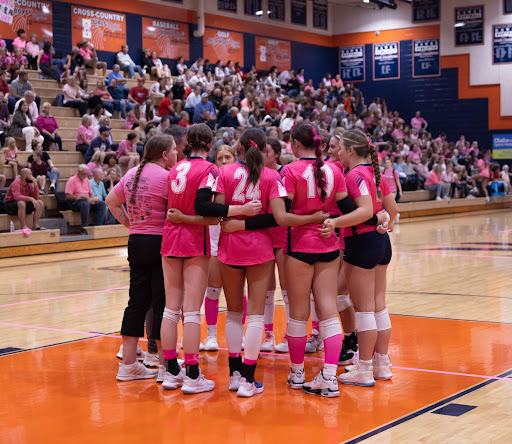 Varsity volleyball played Olathe West at Dig Pink. Olathe east put up a hard fight but lost. Chloe Tyrrell senior says “ I felt very excited, hitting is my favorite thing to do in volleyball and especially against olathe west that was a big game for us.”